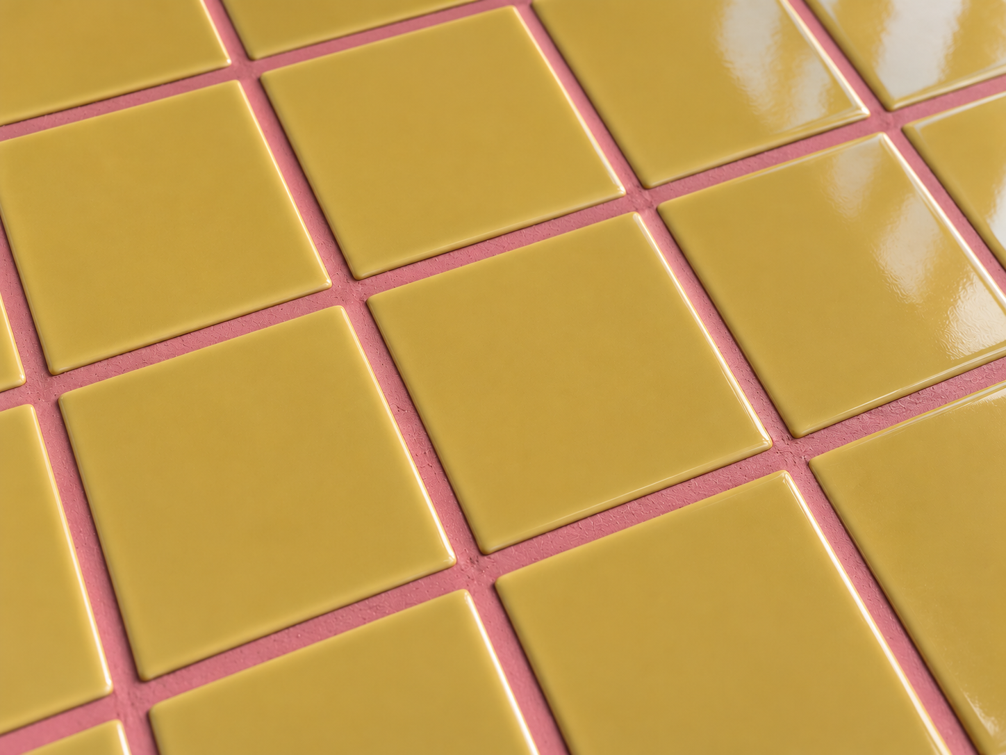 Gros plan sur des carreaux jaune, joint rose